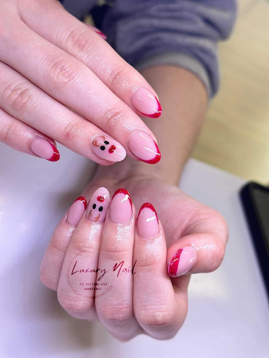 Red tip french with reindeer art